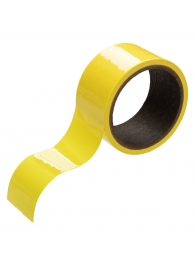 Желтый скотч для связывания Bondage Tape - 18 м. - California Exotic Novelties - купить с доставкой в Абакане