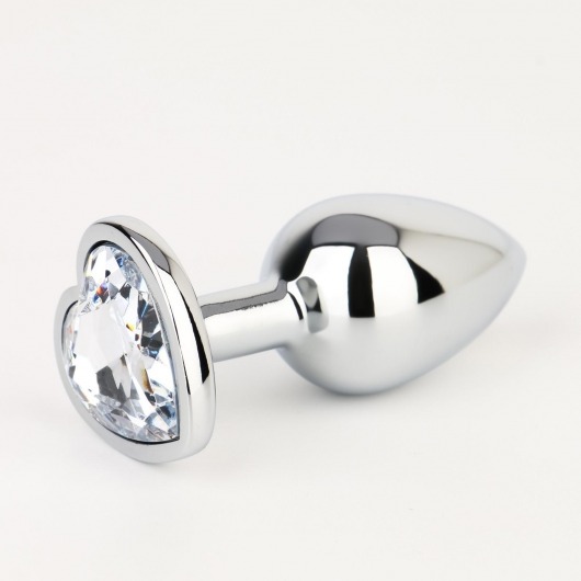 Серебристая анальная пробка с прозрачным кристаллом в форме сердца - 7 см. - Сима-Ленд - купить с доставкой в Абакане